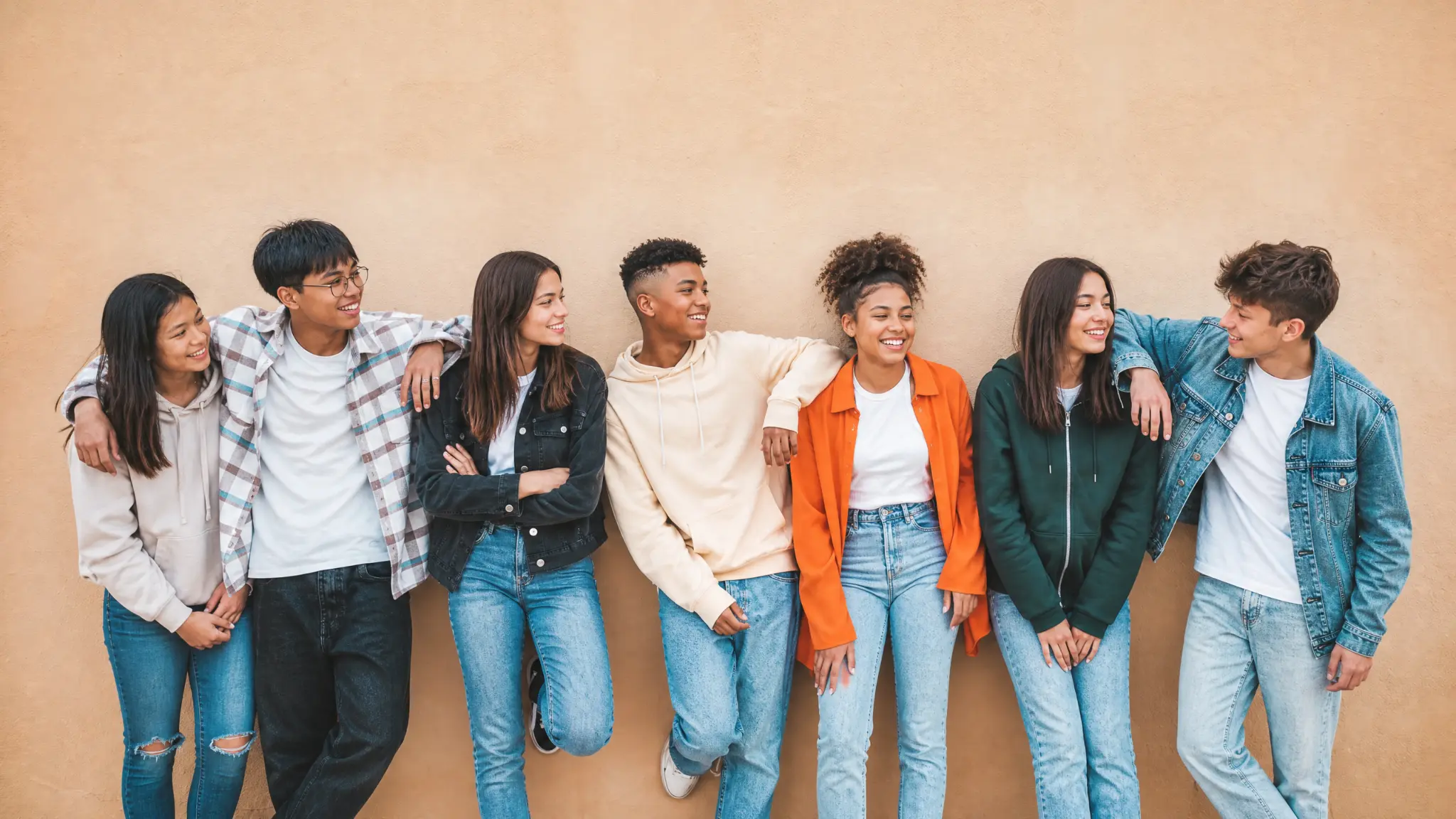 A group of young people sharing a relaxed moment together
